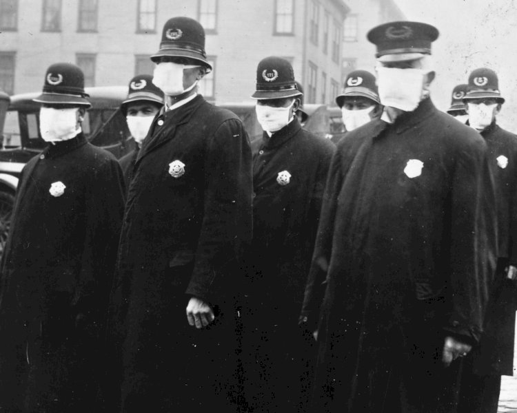 Policemen wearing face masks provided by the Red Cross, during the Spanish flu in 1918